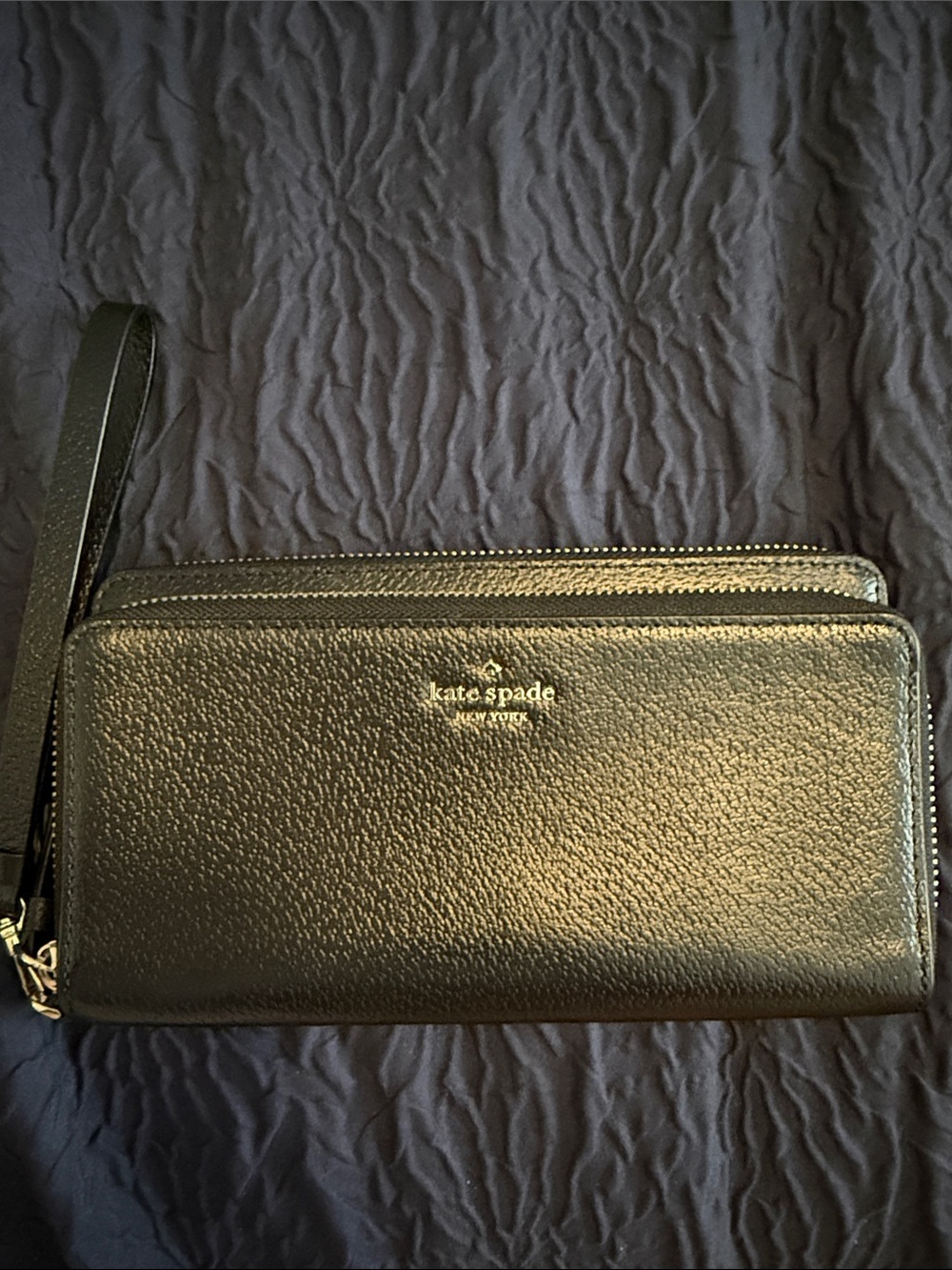 kate spade black pebbled leather wristlet clutch with gold logo